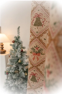 Detail of Christmas jacquard fabric with golden threads and holiday patterns