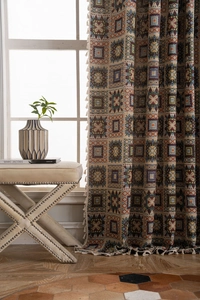 Detailed view of bohemian jacquard curtains with colorful geometric patterns and tassels
