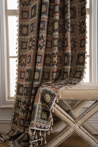 Detailed view of bohemian geometric jacquard fabric with tassels for window decor