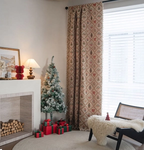 Detailed texture of Christmas curtain with red bows and green bells with tassel fringe