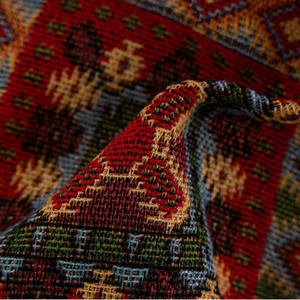 Red geometric jacquard curtains with ethnic weaving texture and intricate knit details