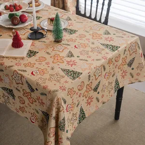 Christmas tablecloth with gingerbread men and snowflakes for holiday dining table decor