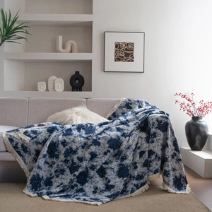 Thick jacquard blue and white floral sofa throw cover with decorative tassels