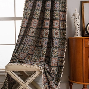 Ethnic geometric jacquard curtain with fringe detail and multi-color pattern