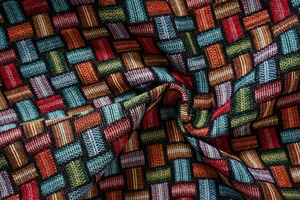 Détail de la texture de tissage jacquard géométrique coloré avec motif tressé arc-en-ciel
