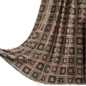 Bohemian geometric knit curtain with multi-color jacquard pattern and tassel detail