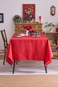 Detail showing the premium red festive tablecloth with fine texture and elegant drape