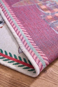 Detail shot of multi-color jacquard fabric showing the intricate ethnic weave texture