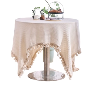 Cream white waffle weave round tablecloth with fringe tassels for dining table