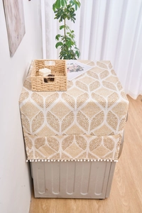 Détail du dessus de lave-linge en coton lin avec motifs géométriques et poches latérales