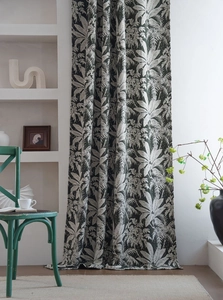 Close-up of tropical leaf jacquard pattern on thick green chenille blackout curtain