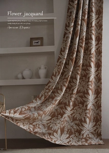 Dettaglio di tende jacquard con motivo a foglie, consistenza spessa e rilievo floreale