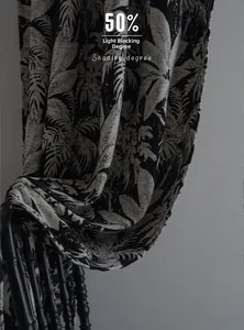 Detail of tropical palm leaf jacquard chenille curtain fabric with 50% shading effect