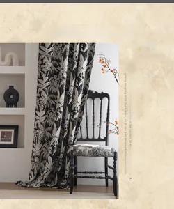 Detail of vintage black and white jacquard floral curtain with heavy chenille fabric texture