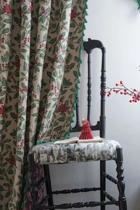 Detailed holly jacquard curtain with red berries, green leaves and tassel trim