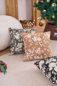 Detailed close-up of chenille jacquard pillowcases with vintage floral patterns in three colors