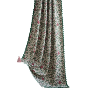 Christmas holly jacquard curtain with green tassel fringe and red berry pattern