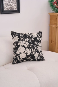 Detailed view of black and white vintage floral chenille jacquard throw pillow texture