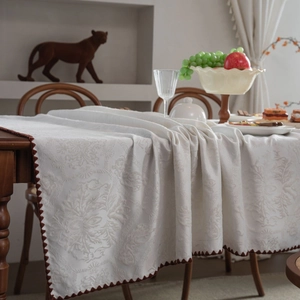 Elegant white damascus jacquard tablecloth with vintage brown scalloped edges for dining decor