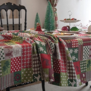 Christmas gingerbread man and reindeer jacquard tablecloth with festive patchwork patterns
