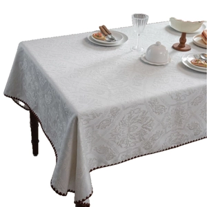 Elegant white damascus jacquard tablecloth with wave edges and floral texture