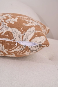 Close-up of invisible zipper and chenille jacquard texture on brown throw pillow cover