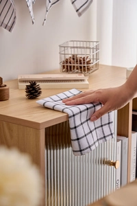 Close-up of a plaid cotton napkin with black grid on white for Nordic table decor