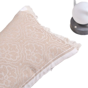 Fodera per cuscino jacquard boho con motivi floreali e dettagli di frange bianche