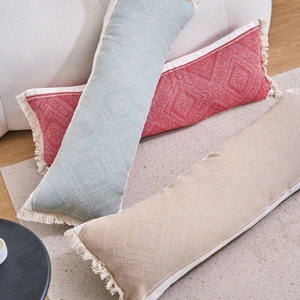 Modern jacquard long lumbar pillow with geometric texture and tassel trim for sofa