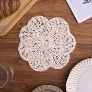 Handmade crochet cotton cup coaster with petal edge and spiral lace pattern for tea ceremony