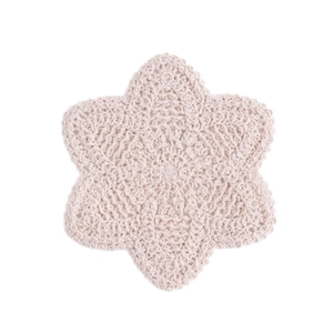 Handmade beige crochet cotton coaster in a hexagonal flower pattern for tea ceremony