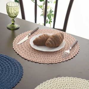 Modern minimalist woven round placemats with tassel design in pink, blue, and white colors