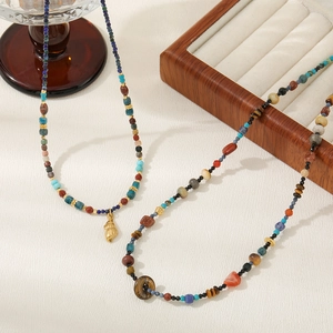 Bohemian natural stone beaded necklace with shell pendant and gold metal accents