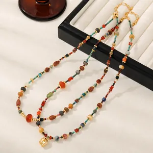 Vintage red agate elephant pendant necklace with colorful natural stone beads and gold accents