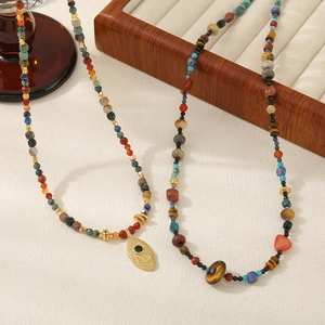 Bohemian beaded necklaces with natural red agate and lapis lazuli in a French vintage style