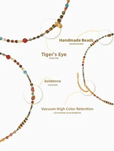 Detail of bohemian handmade beaded necklace with tiger eye stones and gold lobster clasp