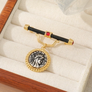 Vintage gold portrait relief brooch with black enamel, red rhinestones and coin pendant