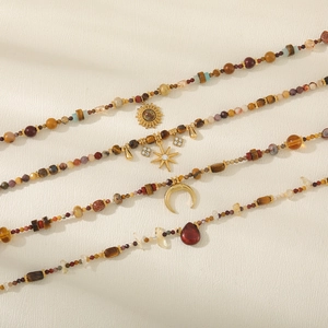 Tigerauge Perlenkette Set mit Sonnen und Mond Anhängern im Vintage Boho Stil