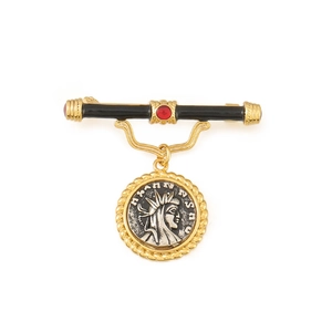 Vintage relief coin brooch with red gemstone accents and black enamel bar design