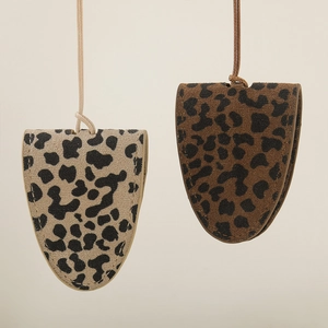 Close-up of leopard print leather sunglass holders with premium stitching and neck straps