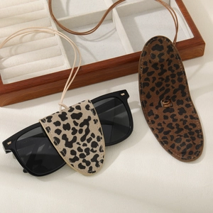 Leopard print leather sunglass pouch with neck strap and black square sunglasses for women