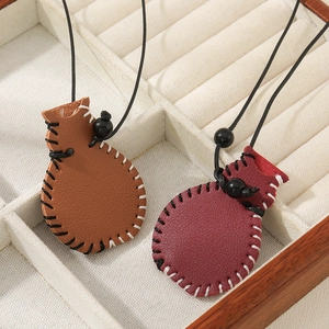Artistic leather vase pendant necklaces in brown and burgundy with black lanyards