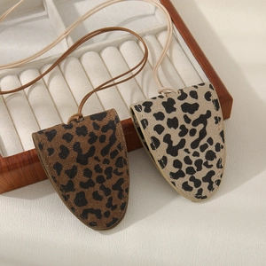 Leopard print leather eyewear case and keychain accessories with woven neck strap