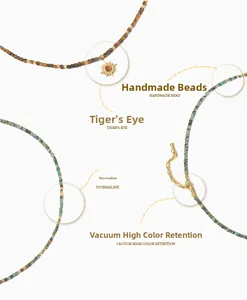 Detailed macro of tiger eye stone necklace with gold sun pendant and premium plating