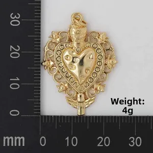 Detailed view of 4g gold heart pendant with baroque floral engraving and measurements
