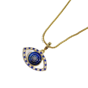 Collar de ojo turco dorado con colgante de circón azul y blanco en una cadena trenzada