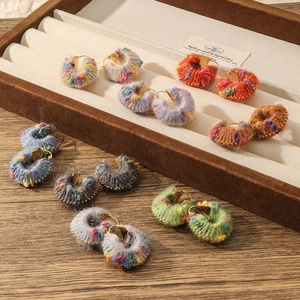 Handmade colorful knit hoop earrings with warm plush texture and vintage golden clasp design