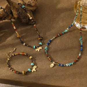 Boho-Schmuckset mit Türkis Tigerauge und Anhängern aus Gold für Damen im Ethno-Stil