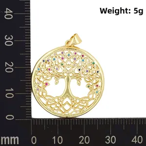 Macro shot of gold tree of life pendant with colorful stones, measuring 35mm diameter