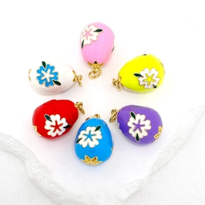 Colorful 14K gold plated enamel Easter egg pendants with floral patterns in six vibrant colors